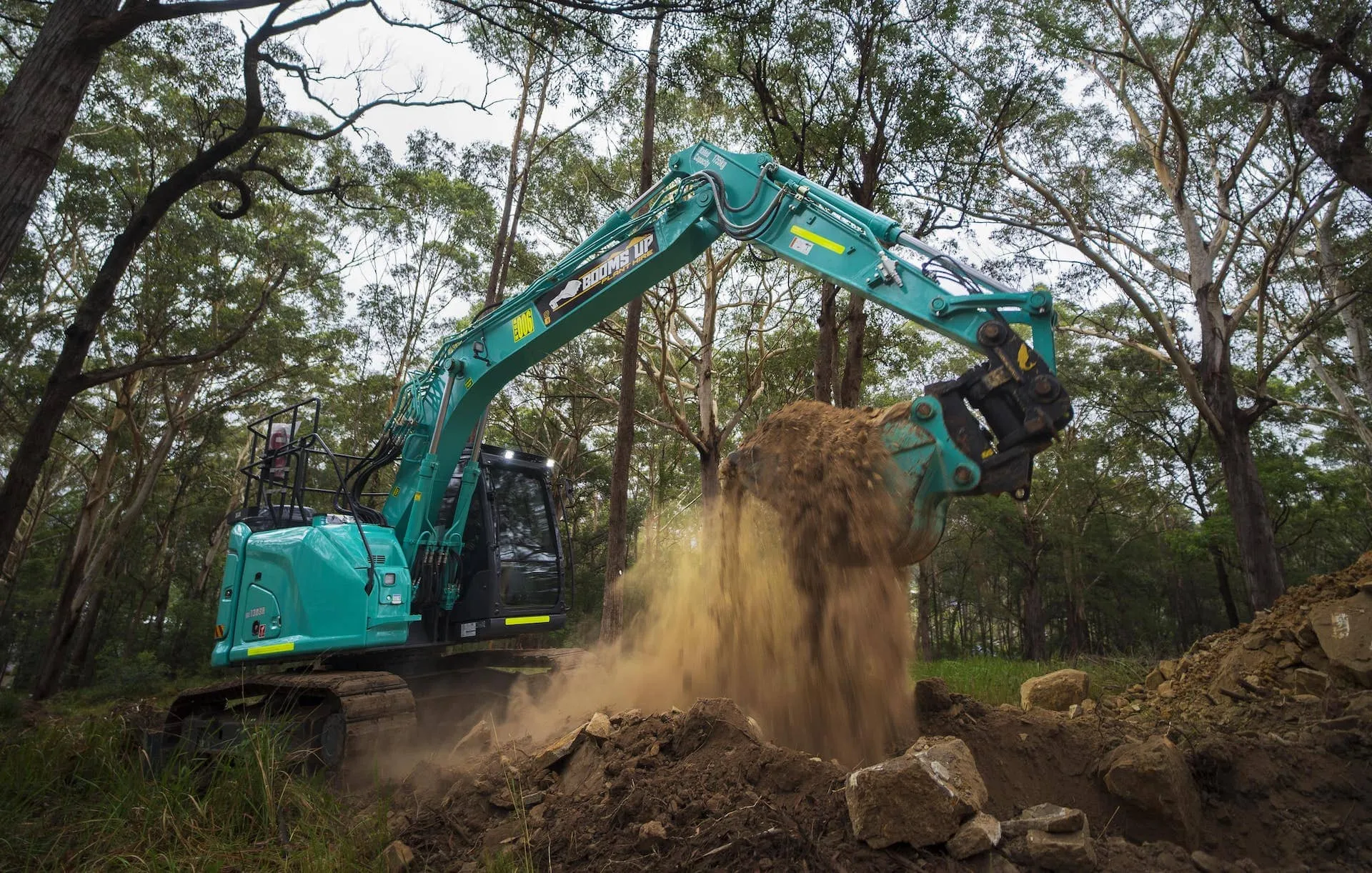 Kobelco excavator bucket attachment digging