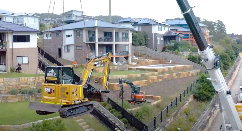 Cat Excavator on a Crane