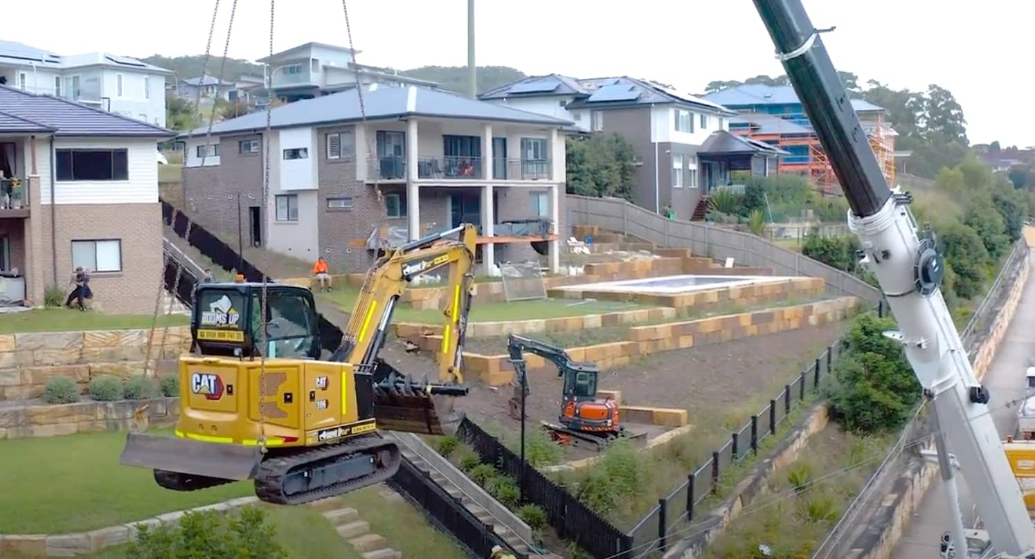 Cat Excavator on a Crane