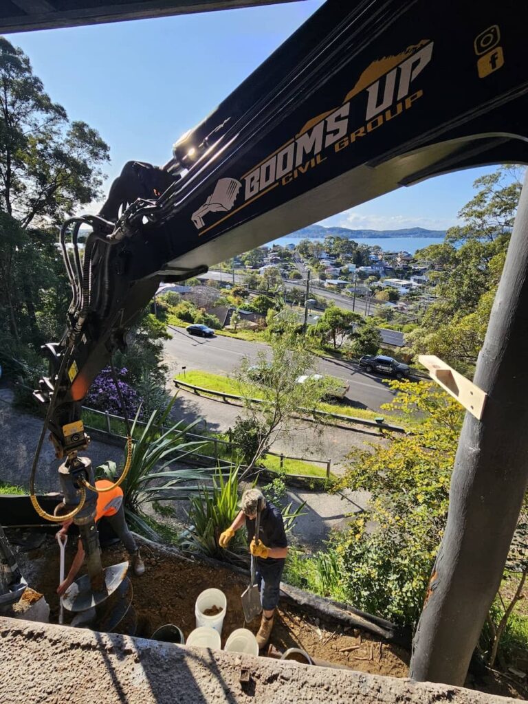 excavator boom landscaping