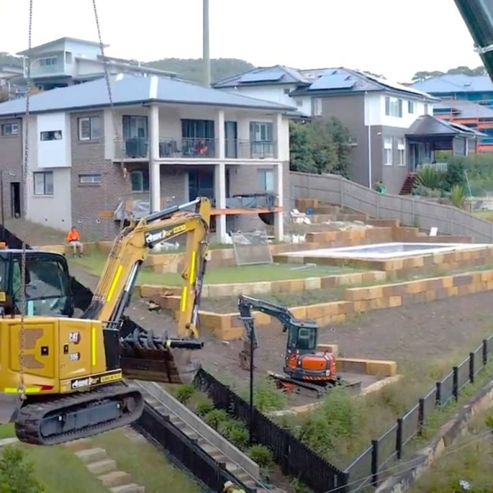 Cat Excavator on a Crane